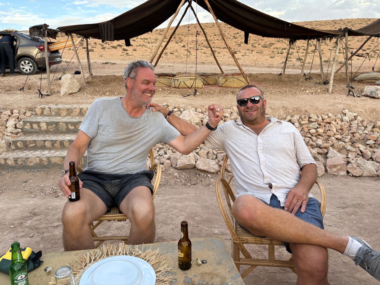 Two Reloaders seated with drinks