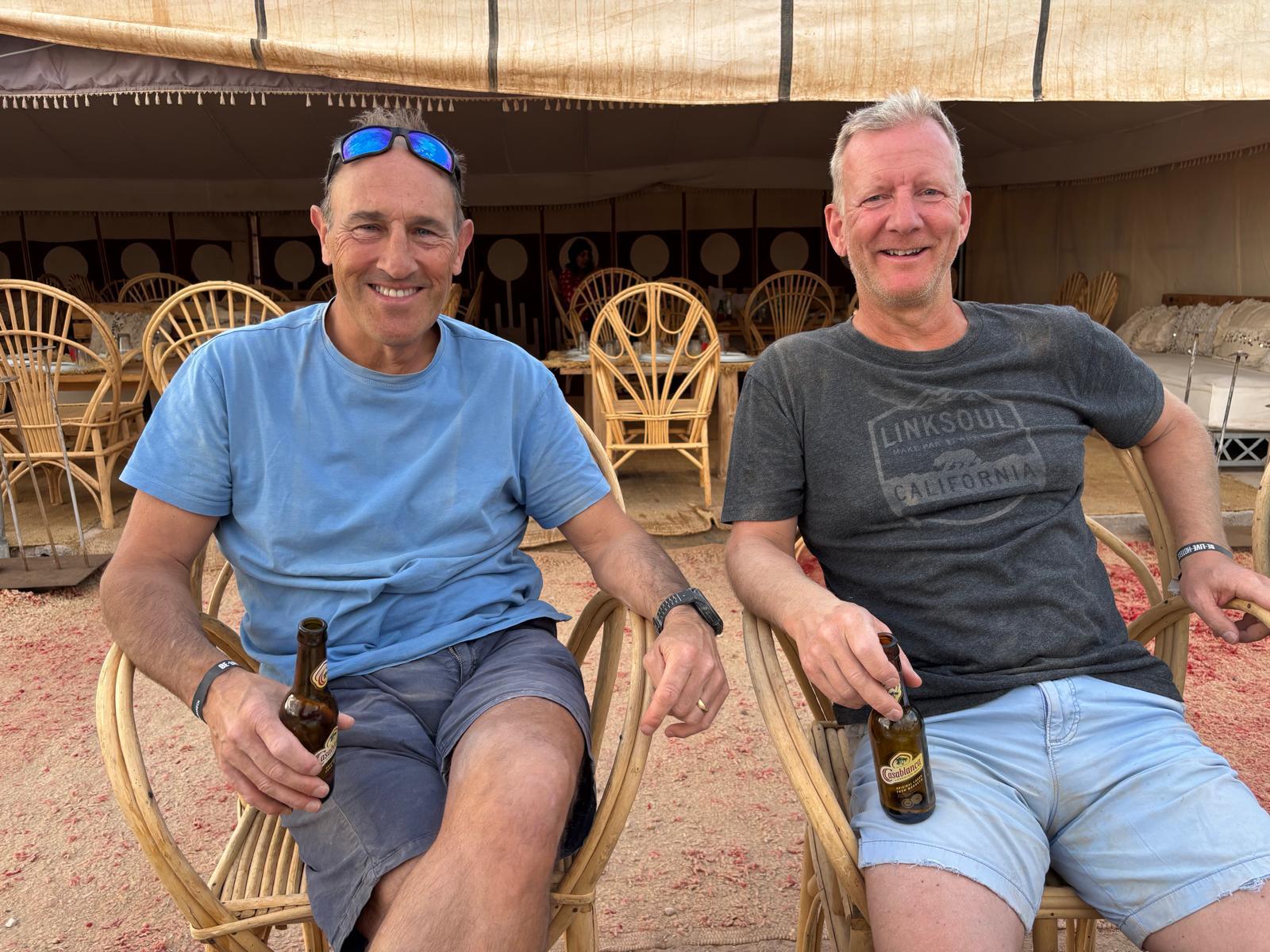 Two Reloaders relaxing with drinks after the ride