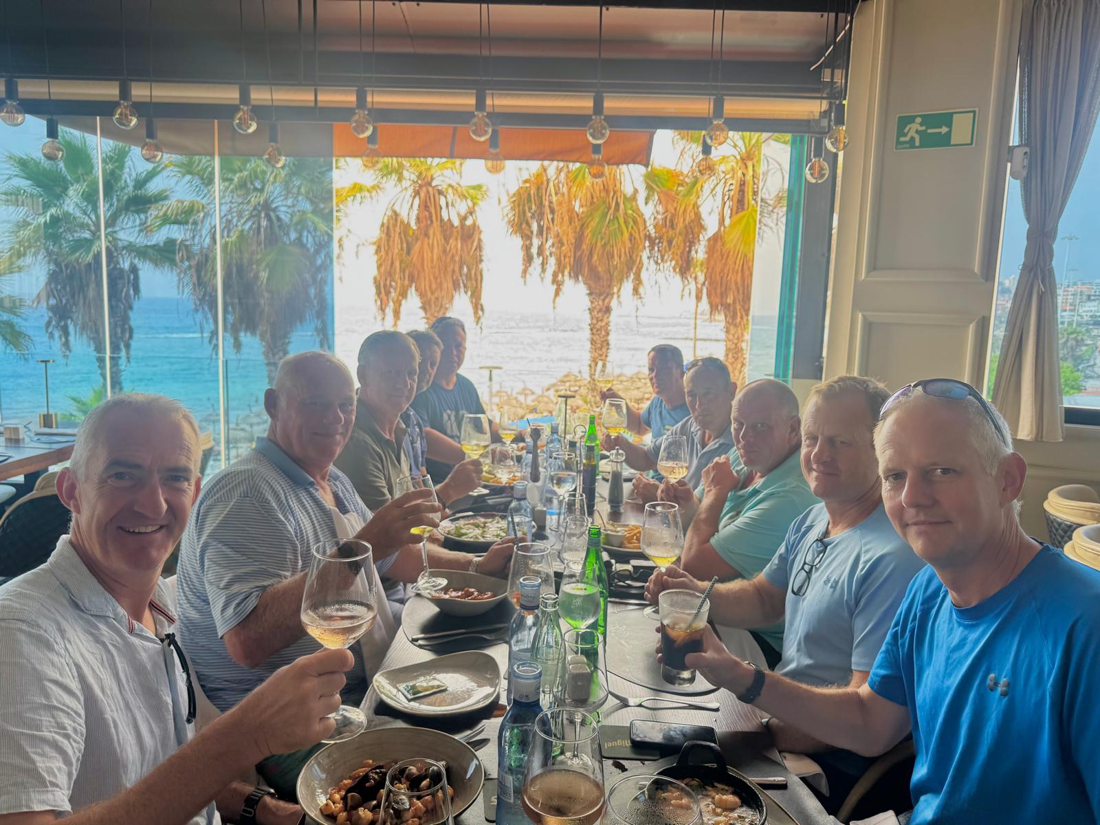 The group around a restaurant table